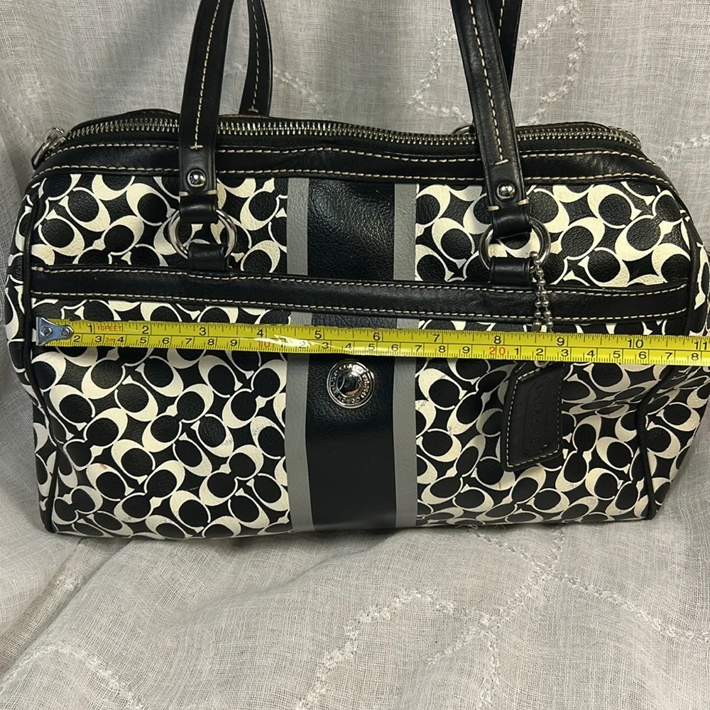 Coach boston leather travel bag with a tag